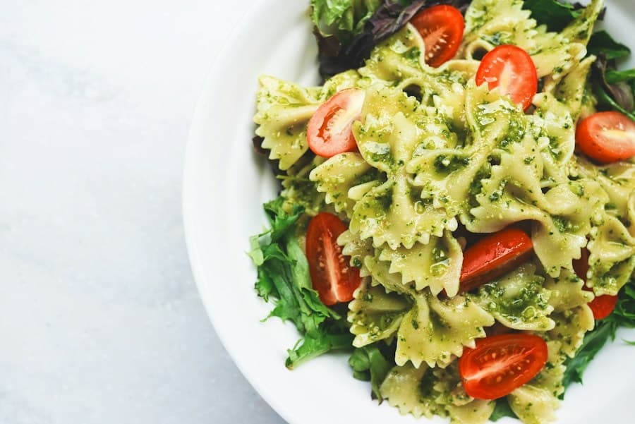 Fresh pesto pasta on artisan ceramic plate